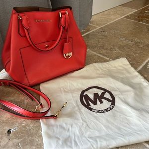 Michael Kors reddish/orangish leather tote with crossbody strap